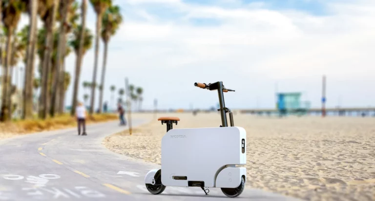 Honda electric scooter folds suitcase-small, priced under $1,000